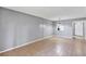 Open-plan living space boasts natural light, tile floor, and access to other rooms at 2864 N Powers Dr # 150, Orlando, FL 32818