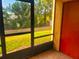 View of a screened patio showing the view of the surrounding greenery at 2864 N Powers Dr # 150, Orlando, FL 32818