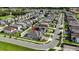 Aerial view of a home's location in a neighborhood with tree-lined streets and nearby amenities at 2922 Crest Dr, Kissimmee, FL 34744