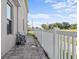 Home backyard featuring a manicured lawn and decorative fencing, creating a private outdoor space at 2922 Crest Dr, Kissimmee, FL 34744