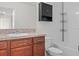 This functional bathroom offers a shower-tub combo and vanity with efficient storage at 2922 Crest Dr, Kissimmee, FL 34744