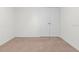 A carpeted bedroom featuring neutral walls and a closet door enhances the home's appeal at 2922 Crest Dr, Kissimmee, FL 34744