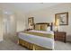 Bedroom with queen size bed, 2 side tables, and carpet at 3060 Pirates Retreat Ct # 309, Kissimmee, FL 34747