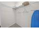 Walk-in closet with wire shelving to maximize storage in the home at 3060 Pirates Retreat Ct # 309, Kissimmee, FL 34747