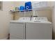 Convenient laundry room area with washer and dryer for easy laundry days at 3060 Pirates Retreat Ct # 309, Kissimmee, FL 34747
