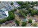Aerial view of property surrounded by lush greenery at 308 Forest St, Fruitland Park, FL 34731