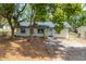 Charming one-story home with well-maintained landscaping at 308 Forest St, Fruitland Park, FL 34731