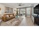 Comfortable seating area with an open floor plan concept and view of outdoor living at 3443 Florigold Grove St, Clermont, FL 34711