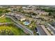 Aerial view of townhomes with community pool near highway at 352 Smugglers Way, Apopka, FL 32712
