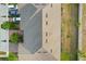 Aerial view of the roof of a townhome and a brick-paved driveway at 352 Smugglers Way, Apopka, FL 32712