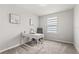 Bright bedroom features neutral walls, grey carpet, and window with blinds at 352 Smugglers Way, Apopka, FL 32712