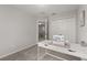 This bedroom has neutral walls, plush grey carpet, and a closet at 352 Smugglers Way, Apopka, FL 32712