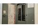 Modern electrical panel with clearly labeled circuits and safety features for home's electrical system at 352 Smugglers Way, Apopka, FL 32712