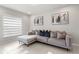Comfortable living room with tile floors, couch, and artwork at 352 Smugglers Way, Apopka, FL 32712