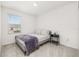 Cozy bedroom features a comfortable bed and a bright window at 3575 Landing Net Dr, Kissimmee, FL 34746