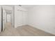 Bedroom featuring closet doors and neutral colored carpet at 3575 Landing Net Dr, Kissimmee, FL 34746
