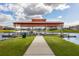 Community boat dock with covered area, providing convenient waterfront access for residents at 3575 Landing Net Dr, Kissimmee, FL 34746