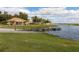 Exterior view of Boat & Fishing Club with lake and fishing dock at 3575 Landing Net Dr, Kissimmee, FL 34746