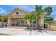 Exterior of the Boat and Fishing Club features well-maintained landscaping at 3575 Landing Net Dr, Kissimmee, FL 34746