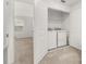 Bright laundry room featuring a washer and dryer at 3575 Landing Net Dr, Kissimmee, FL 34746