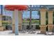 Fun splash pad with a mushroom water feature and comfortable seating surrounded by a beautiful community at 3575 Landing Net Dr, Kissimmee, FL 34746
