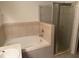 Bathroom featuring a separate shower and large soaking tub at 369 St Georges Cir, Eagle Lake, FL 33839