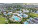 An overhead perspective of the water park area with pools and water slides for recreational activities and community enjoyment at 420 Burma St, Kissimmee, FL 34747