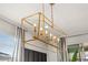 Contemporary dining room chandelier with energy-efficient lighting, perfect for adding modern elegance to your dining experience at 420 Burma St, Kissimmee, FL 34747