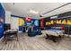 Entertainment room featuring a pool table, air hockey and video game consoles at 420 Burma St, Kissimmee, FL 34747