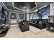 Amazing home theater with seating, themed decor, and a popcorn machine for immersive entertainment at 420 Burma St, Kissimmee, FL 34747