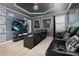 Luxurious home theater featuring comfortable seating, cinematic screen, and Star Wars accents at 420 Burma St, Kissimmee, FL 34747