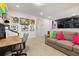 Spacious living room with plush seating, desk, and playful decor for versatile living at 420 Burma St, Kissimmee, FL 34747