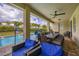 Spacious patio with multiple seating areas and outdoor dining, overlooking the pool and backyard at 420 Burma St, Kissimmee, FL 34747
