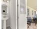 Modern powder room with pedestal sink and easy access to the covered patio at 420 Burma St, Kissimmee, FL 34747