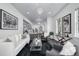 Well-lit living room featuring contemporary decor and comfortable seating arrangement at 423 Arbor Cir, Celebration, FL 34747