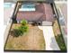 Aerial perspective of the property featuring a front lawn, long driveway and pool at 4412 Mesa Verde Dr, St Cloud, FL 34769