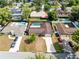 Aerial view of a residential neighborhood with well-manicured lawns and private pools at 4412 Mesa Verde Dr, St Cloud, FL 34769