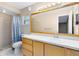 Bathroom with a shower, large mirror, and vanity with lots of storage space at 4412 Mesa Verde Dr, St Cloud, FL 34769