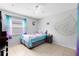 Charming bedroom featuring playful decor, a cozy bed, and lots of natural light at 4412 Mesa Verde Dr, St Cloud, FL 34769