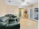 Spacious living room with access to the kitchen and lanai, creating an open and inviting atmosphere at 4412 Mesa Verde Dr, St Cloud, FL 34769