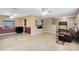 Open-concept living area featuring tile floors, a ceiling fan, and comfortable seating at 4412 Mesa Verde Dr, St Cloud, FL 34769