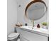 Bathroom features a floating vanity with a modern sink and gold faucet, creating a minimalist and elegant space at 5234 Eaglesmere Dr # D04, Orlando, FL 32819