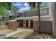 Well-maintained two-story townhouse with a charming front entrance and vibrant landscaping, showcasing curb appeal at 5234 Eaglesmere Dr # D04, Orlando, FL 32819