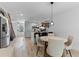 Spacious living area with hardwood floors, open to kitchen and dining, perfect for modern living and entertaining at 5234 Eaglesmere Dr # D04, Orlando, FL 32819
