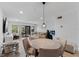 Inviting open-concept living space with a dining area, comfortable seating, and access to the outdoors at 5234 Eaglesmere Dr # D04, Orlando, FL 32819