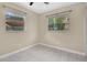 Bedroom with tile floor and two windows providing ample natural light at 5234 Ohio St, Winter Park, FL 32792