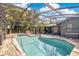 Screened-in pool with brick patio offers relaxation and privacy at 5234 Ohio St, Winter Park, FL 32792