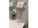 Bathroom with fresh towels, decor and toiletries on the modern countertop at 5245 W Irlo Bronson Memorial Hwy # 148, Kissimmee, FL 34746
