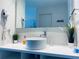 Modern bathroom featuring a vessel sink, vanity, and decorative plants at 5245 W Irlo Bronson Memorial Hwy # 148, Kissimmee, FL 34746