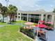 Enjoy outdoor dining with a view from this condo's patio area overlooking manicured landscape at 5245 W Irlo Bronson Memorial Hwy # 148, Kissimmee, FL 34746